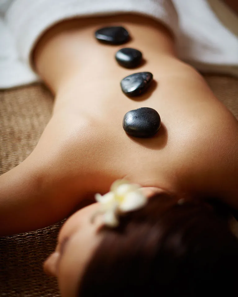 A person finding answers to common spa and massage questions in Chandigarh.